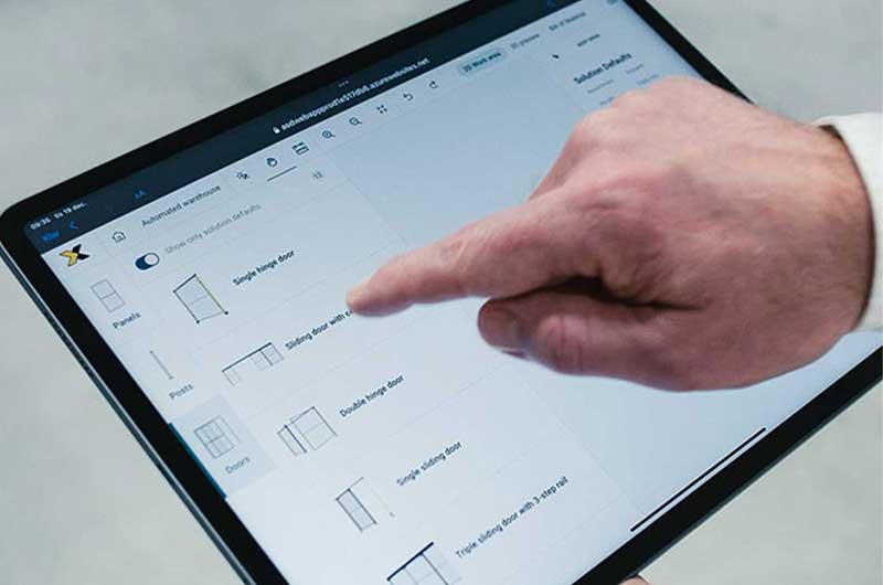 A finger pointing on a tablet